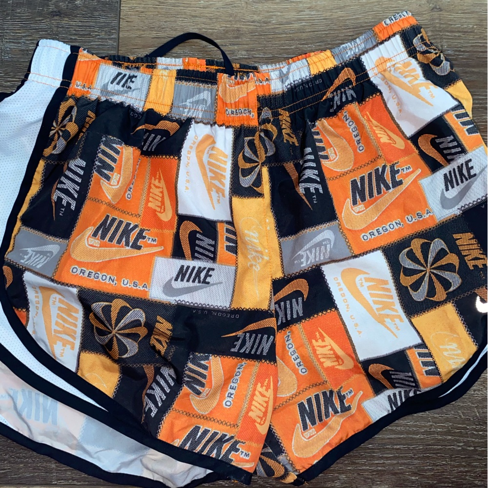 Nike Women’s Black and Orange Athletic Shorts